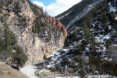 23 Highway 93 Winds through Steep Cliffs At Radium Hot Springs In Winter.jpg